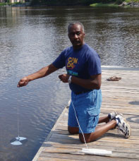 Lemuel Patterson takes Secchi disc information in a Georgia tidal creek during ’09 Coastal Legacy
